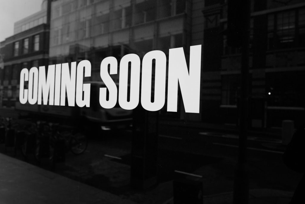 coming soon in white words on black background